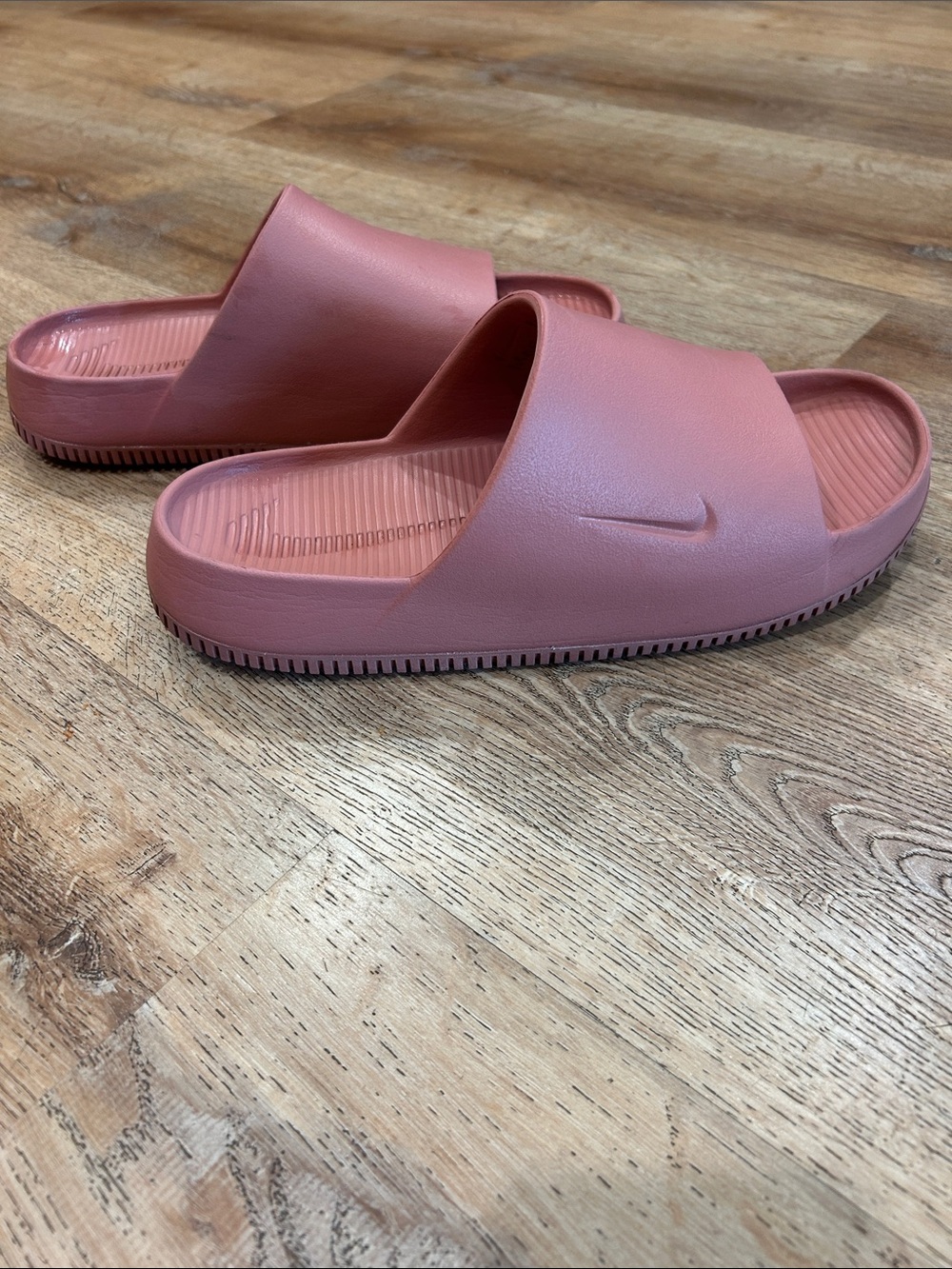Nike Canyon Pink Calm Slide Sandals.